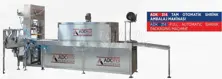 AUTOMATIC SHRINK PACKAGING MACHINE